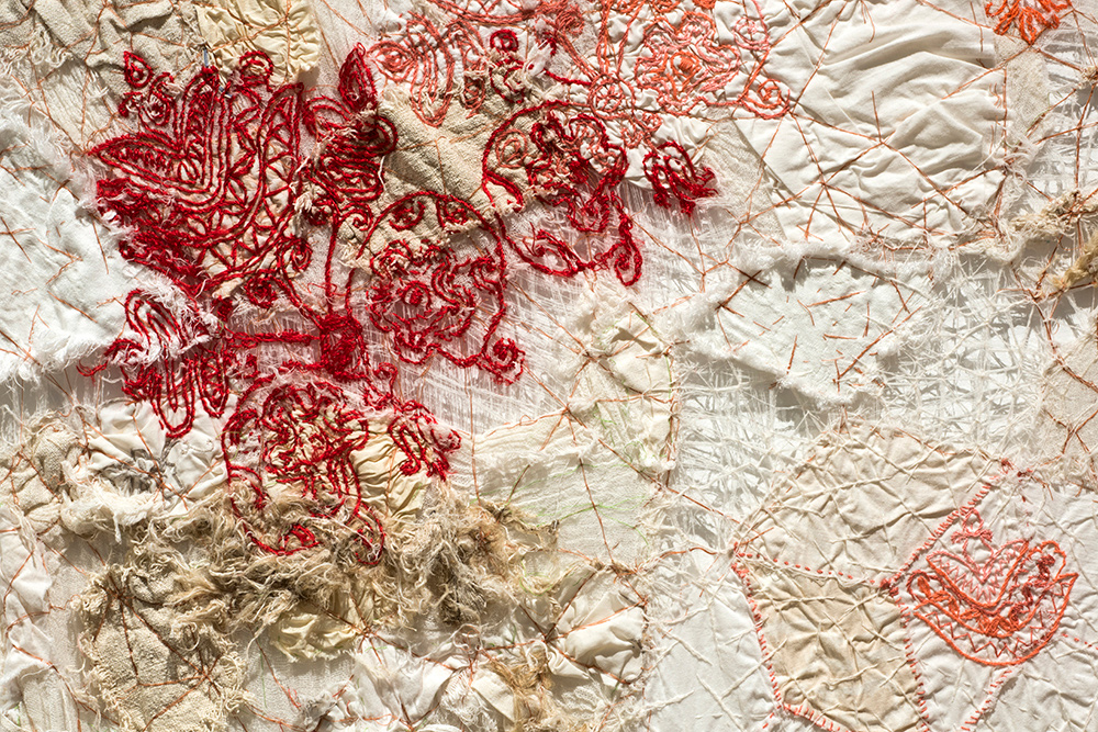 Traditional Hungarian embroidery in red and browns.