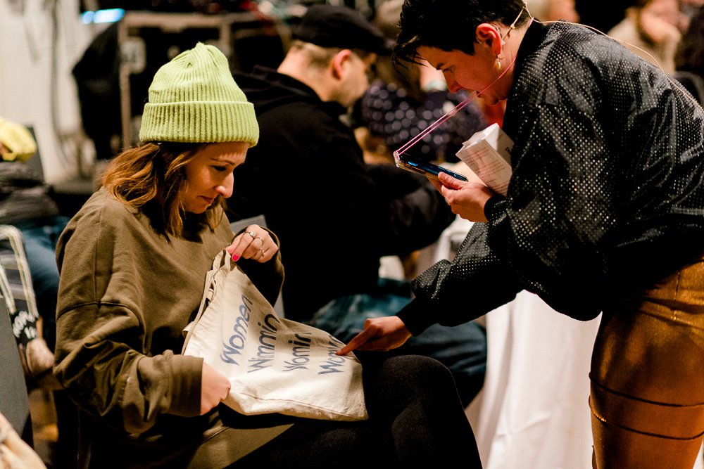 Vanessa Dion Fletcher engaging with an audience member.