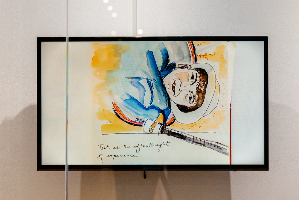 A television screen with a watercolour painting of a person